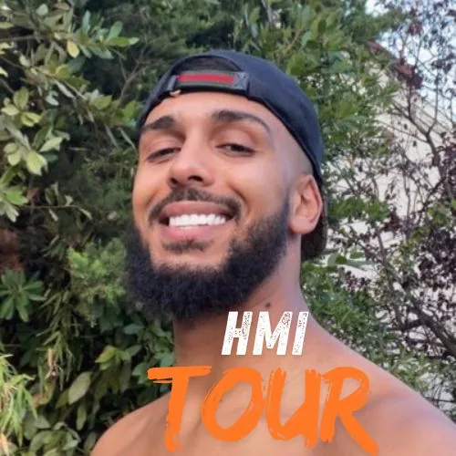Hachemi smiling in a backwards cap on the HMI Tour poster